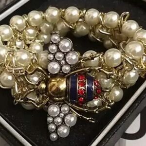 Elegant Gold and Pearl Bee Bracelet